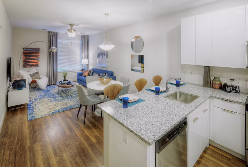 Modern kitchen with stainless steel appliances at Osprey Cove Apartments