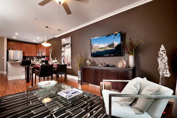 Spacious living room with modern decor at Osprey Cove Apartments