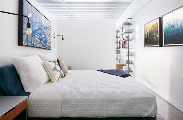 Elegant bedroom with modern decor at Watermark Seaport Apartments