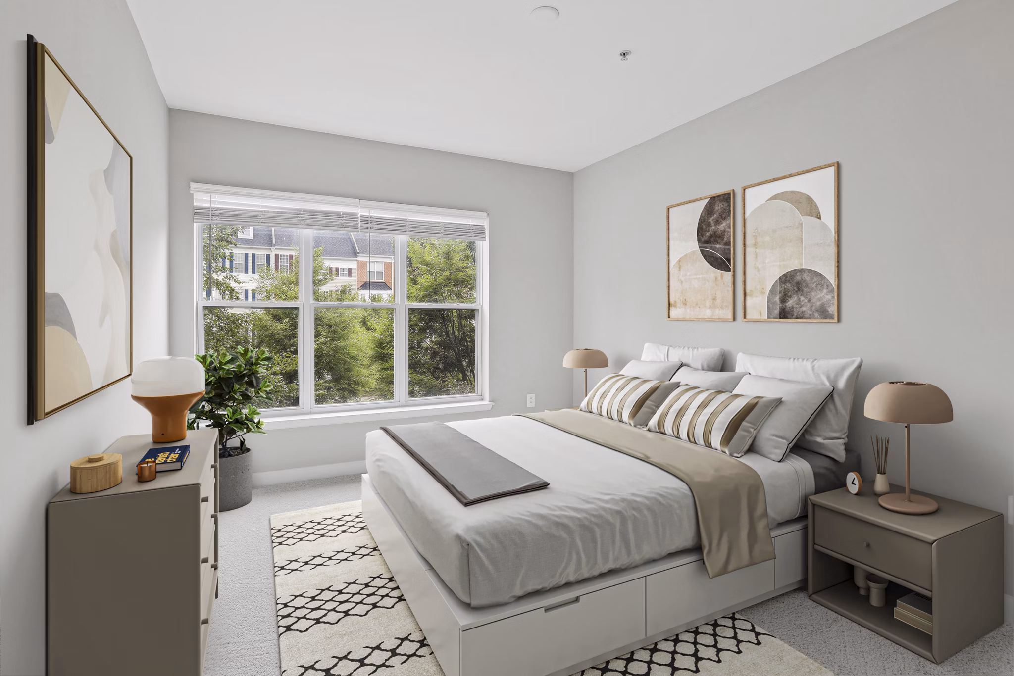 Bedroom featuring modern decor and neutral tones at Midtown at Camp Springs Apartments