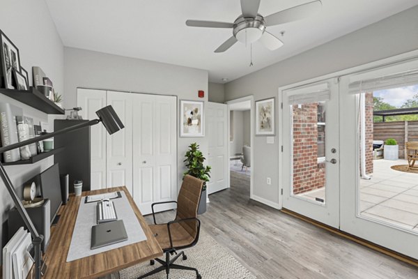 Elegant clubhouse lobby with modern furnishings at Midtown at Camp Springs Apartments