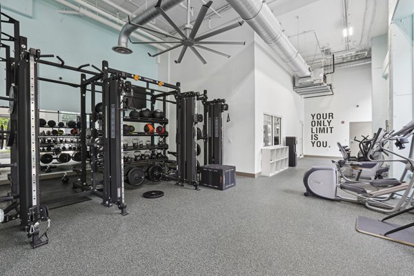 State-of-the-art fitness center with modern equipment at Midtown at Camp Springs Apartments