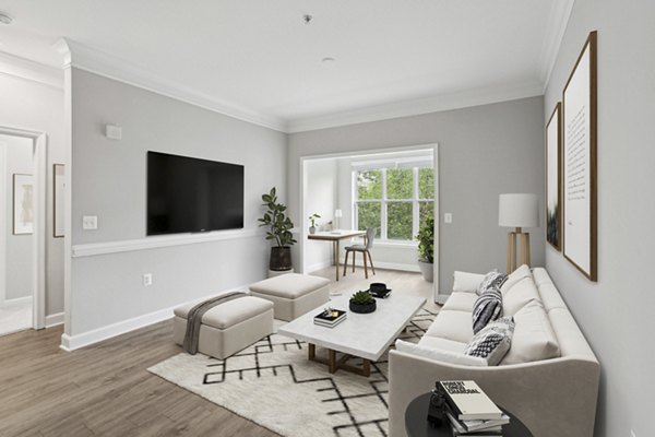 Living room with contemporary furniture and large windows at Midtown at Camp Springs Apartments