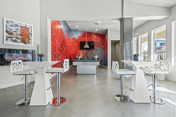 Contemporary clubhouse and leasing office at Envision Apartments, offering luxury living amenities and community spaces