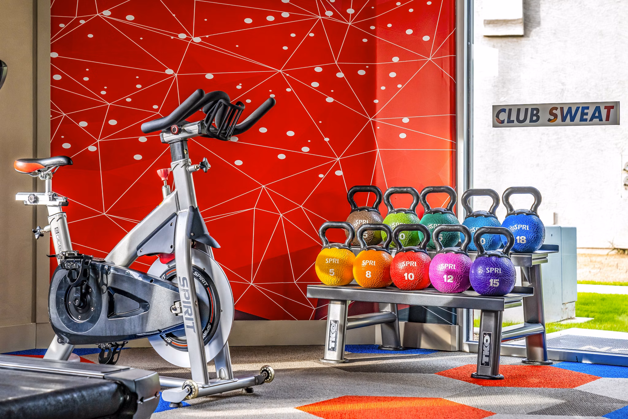 Fitness center with state-of-the-art equipment at Envision Apartments, enhancing tenant wellness and promoting an active lifestyle