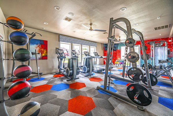 State-of-the-art fitness center at Envision Apartments with modern equipment and ample space for effective workouts