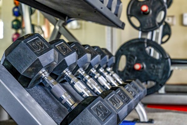 State-of-the-art fitness center with modern equipment at Envision Apartments, offering luxury amenities for active lifestyles