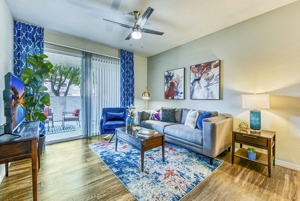 Modern living room featuring elegant decor and open layout in Envision Apartments