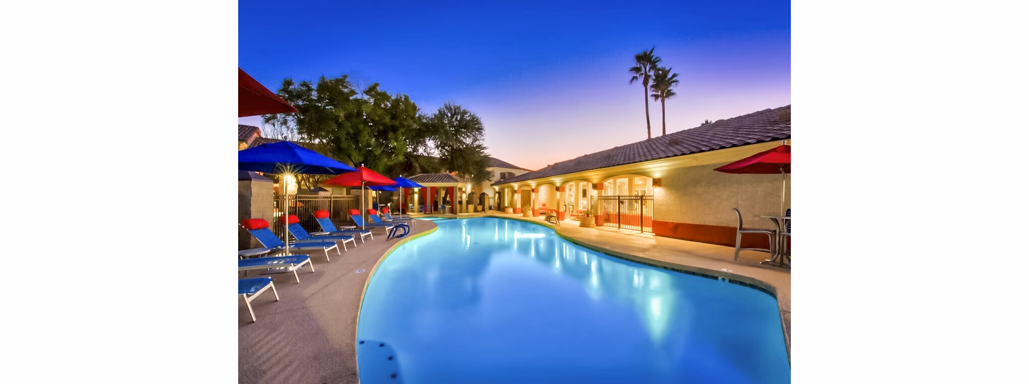 Luxurious poolside retreat at Envision Apartments with modern design and serene ambiance