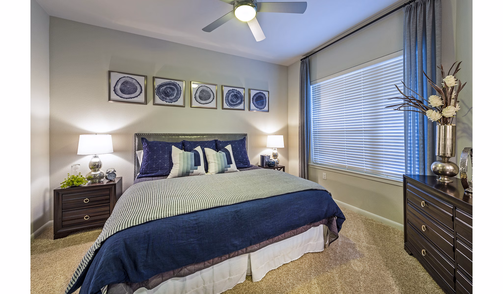 Cozy bedroom with modern decor and natural light in Elan Memorial Park Apartments