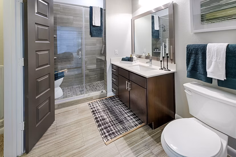 Spacious bathroom with modern fixtures at Elan Memorial Park Apartments