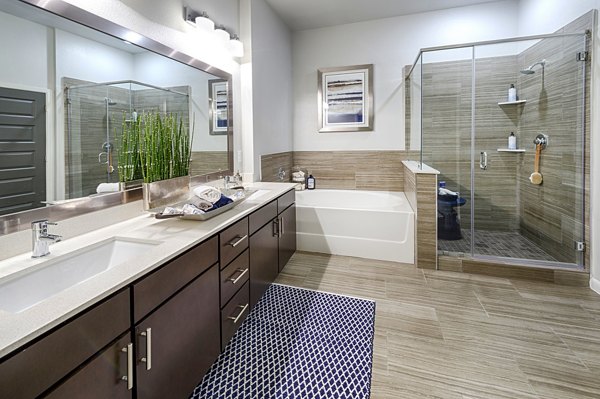 Luxurious bathroom with modern fixtures at Elan Memorial Park Apartments