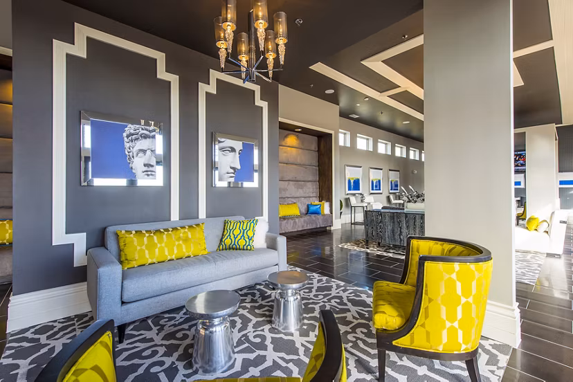 Luxurious clubhouse lobby with modern decor at Elan Memorial Park Apartments, ideal for social gatherings and relaxation