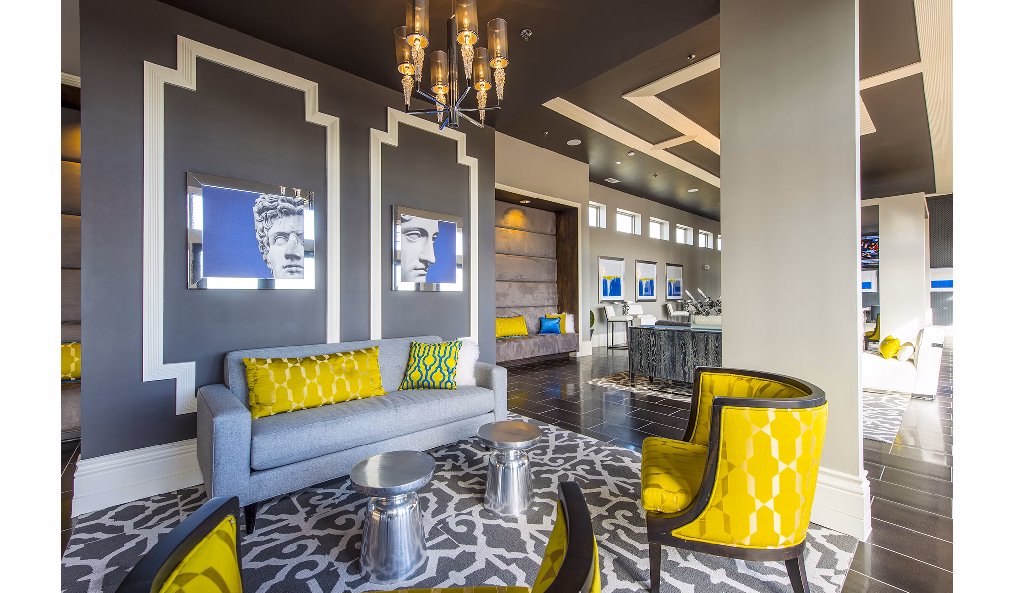 Luxurious clubhouse lobby with modern decor at Elan Memorial Park Apartments, ideal for social gatherings and relaxation