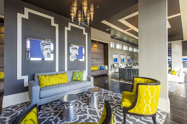 Luxurious clubhouse lobby with modern decor at Elan Memorial Park Apartments, ideal for social gatherings and relaxation