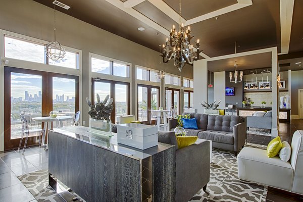 Clubhouse at Elan Memorial Park Apartments featuring luxury interiors and modern amenities for social gatherings in a vibrant community setting