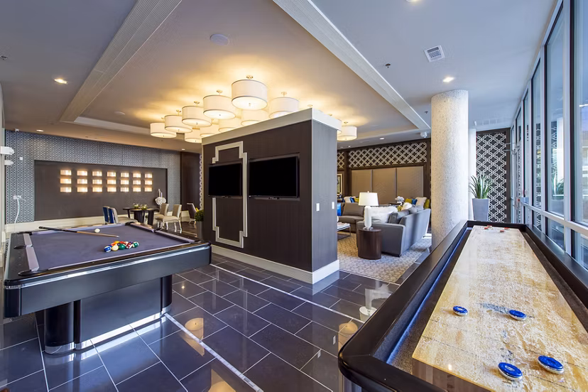 Game room featuring billiards and lounge seating at Elan Memorial Park Apartments