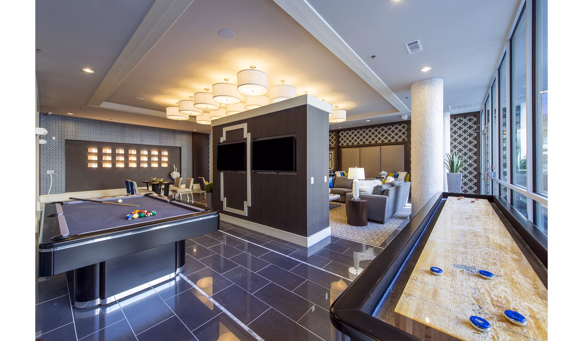 Game room featuring billiards and lounge seating at Elan Memorial Park Apartments