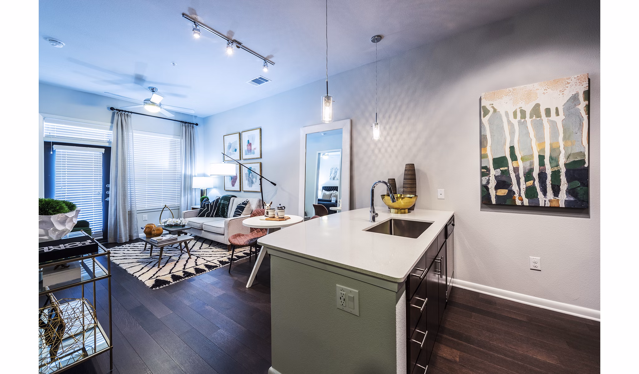 Modern kitchen with sleek appliances and granite countertops at Elan Memorial Park Apartments in Houston