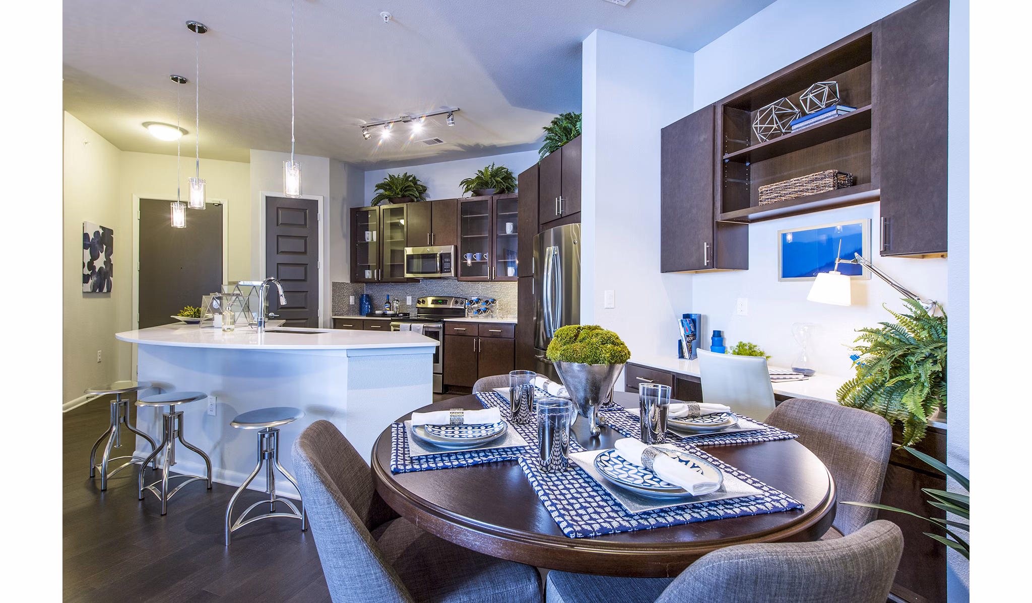 Dining room featuring modern furnishings and elegant lighting at Elan Memorial Park Apartments