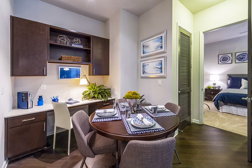 Dining room featuring elegant decor and modern lighting at Elan Memorial Park Apartments