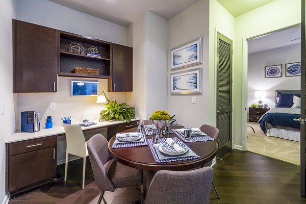 Dining room featuring elegant decor and modern lighting at Elan Memorial Park Apartments