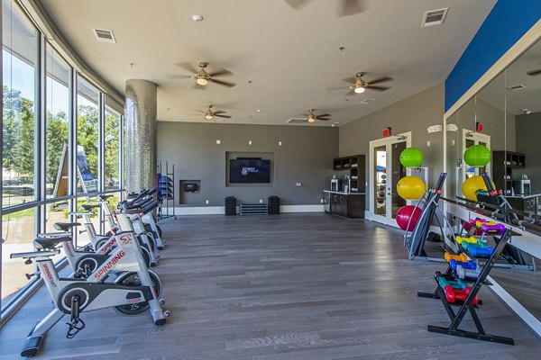 Modern spin studio with state-of-the-art equipment at Elan Memorial Park Apartments, perfect for fitness enthusiasts in luxury living