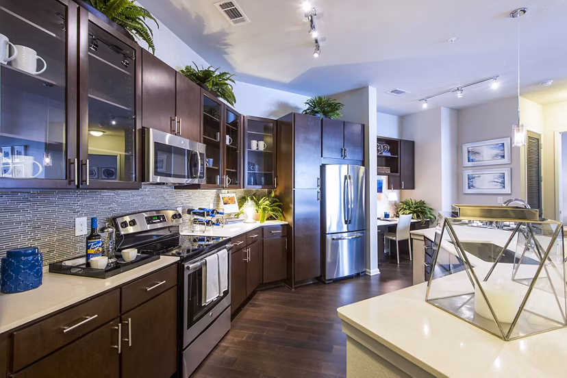 Modern kitchen with stainless steel appliances at Elan Memorial Park Apartments luxury living space