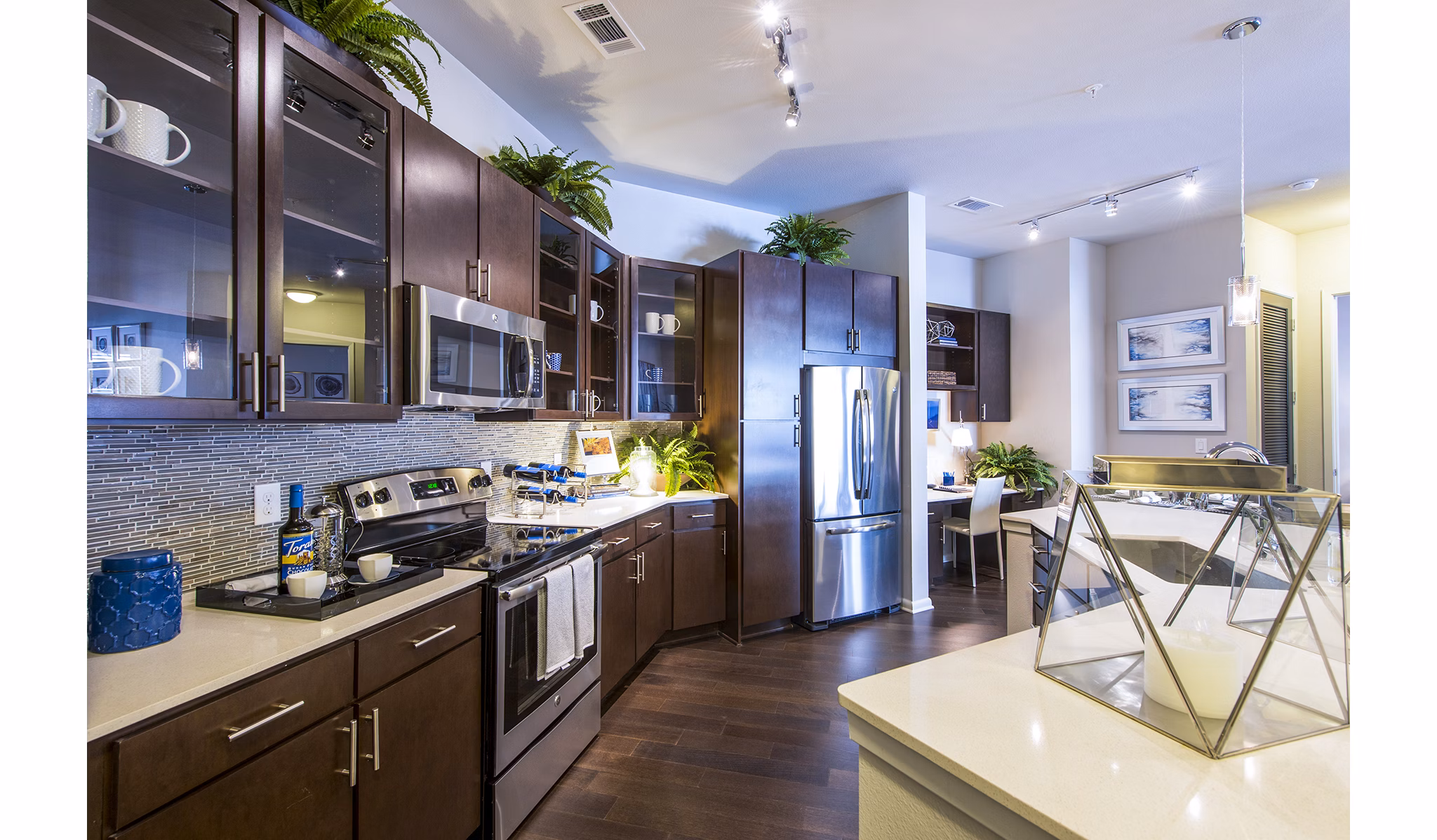 Modern kitchen with stainless steel appliances at Elan Memorial Park Apartments luxury living space