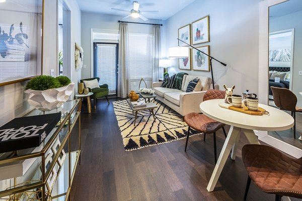 Spacious living room with modern decor at Elan Memorial Park Apartments