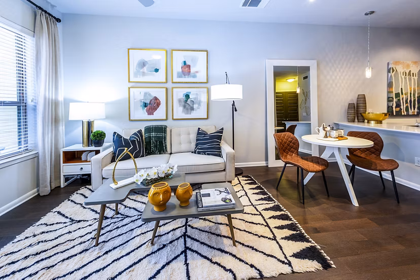 Stylish living room with modern decor and natural light at Elan Memorial Park Apartments