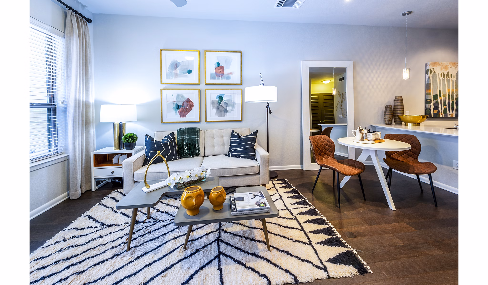 Stylish living room with modern decor and natural light at Elan Memorial Park Apartments