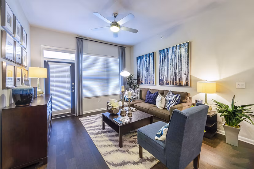 Living room with modern decor and natural light at Elan Memorial Park Apartments