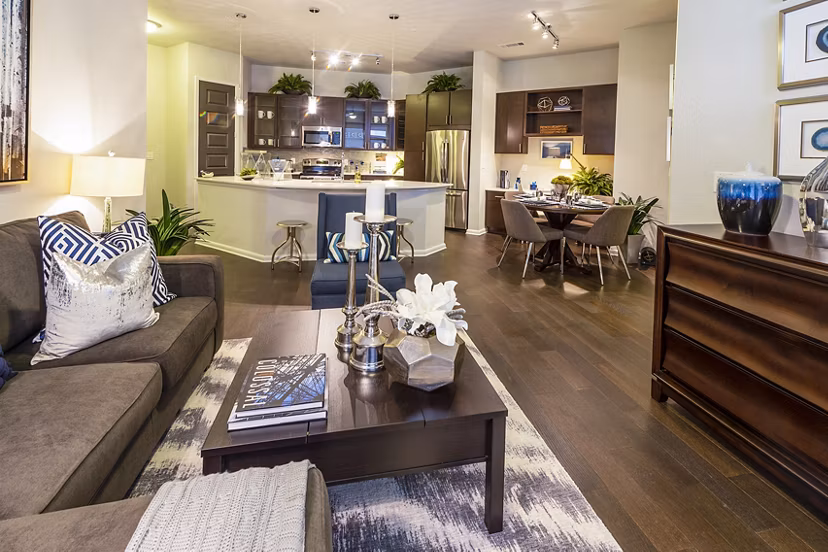 Spacious living room with modern decor in Elan Memorial Park Apartments