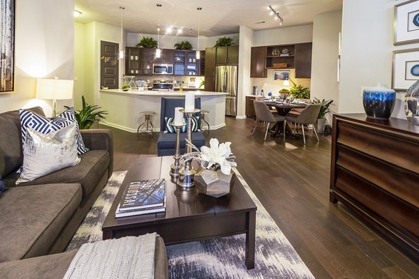 Spacious living room with modern decor in Elan Memorial Park Apartments