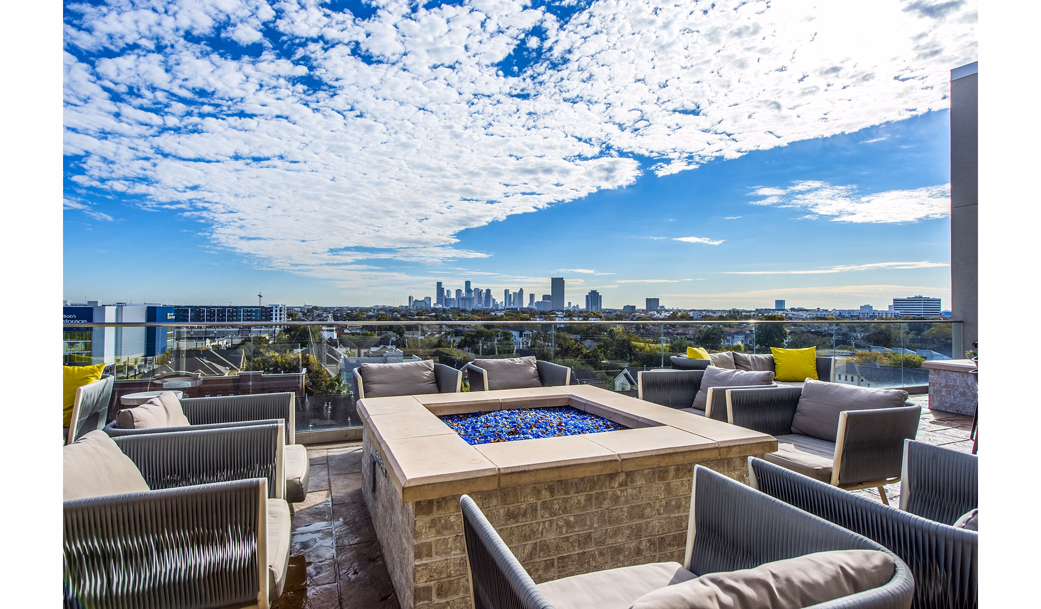 Cozy outdoor seating with fire pit at Elan Memorial Park Apartments
