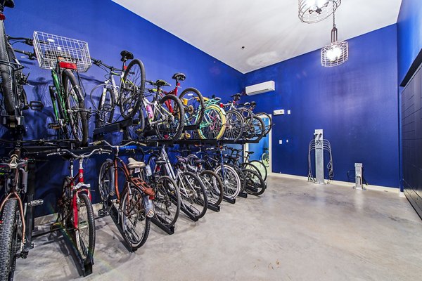 Bicycle storage room with secure racks at Elan Memorial Park Apartments, providing convenient and safe options for residents