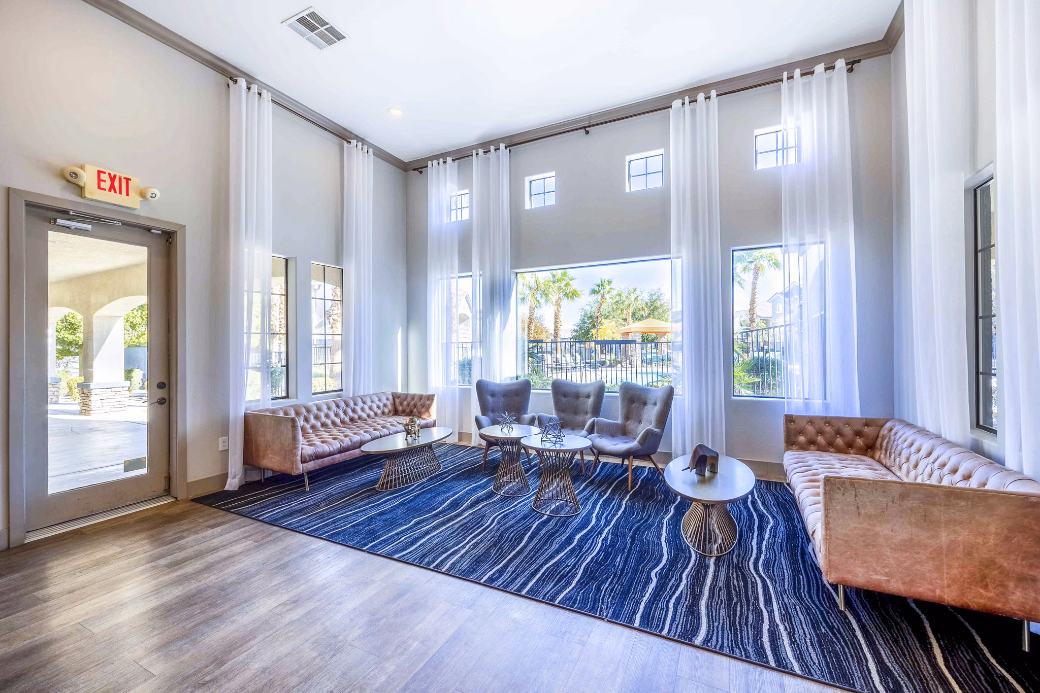 Elegant clubhouse lobby with modern decor at Tesoro Ranch Apartments, offering luxurious community spaces for residents