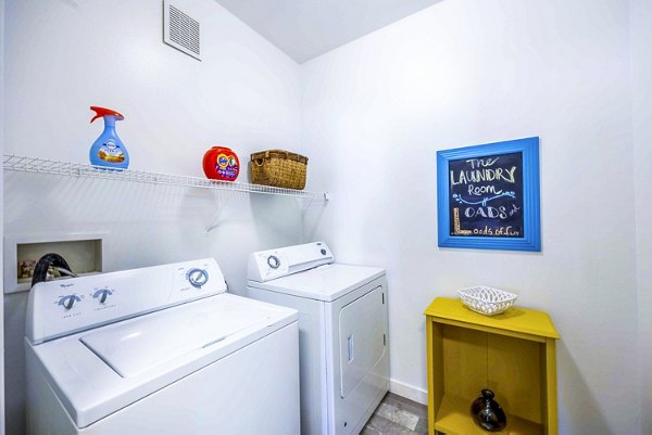 Laundry room with modern appliances at Tesoro Ranch Apartments