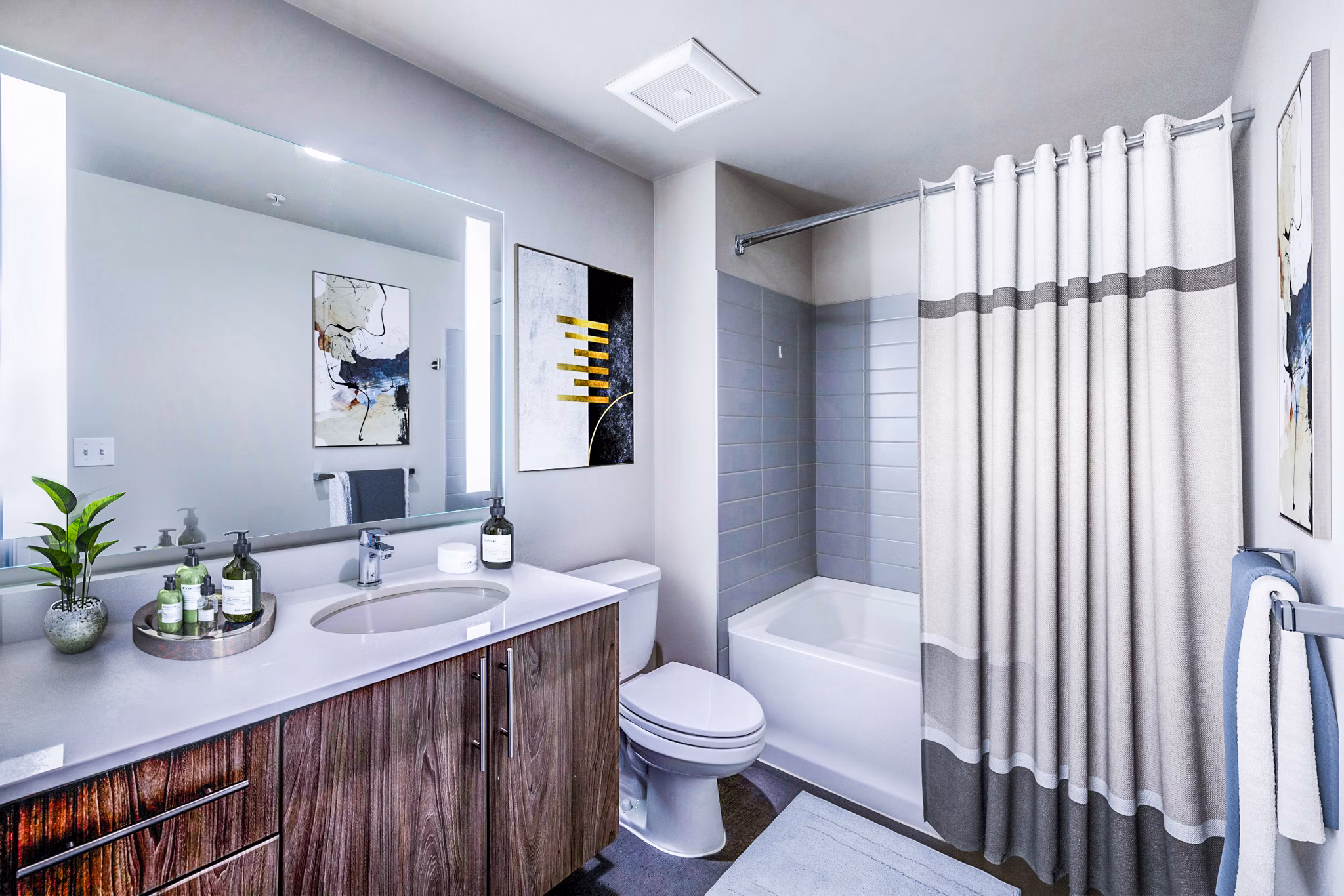 Luxurious bathroom with modern fixtures at Sequel Apartments in a Greystar luxury living community
