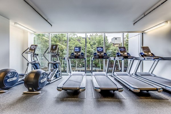 State-of-the-art fitness center with modern equipment at Sequel Apartments, ideal for luxury living and wellness