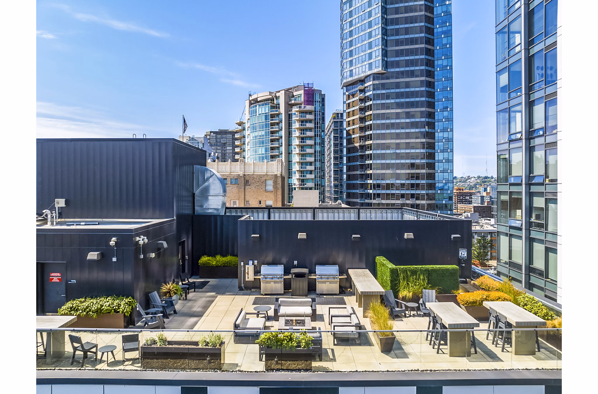 Spacious patio with modern seating at Sequel Apartments, luxury living in a prime location