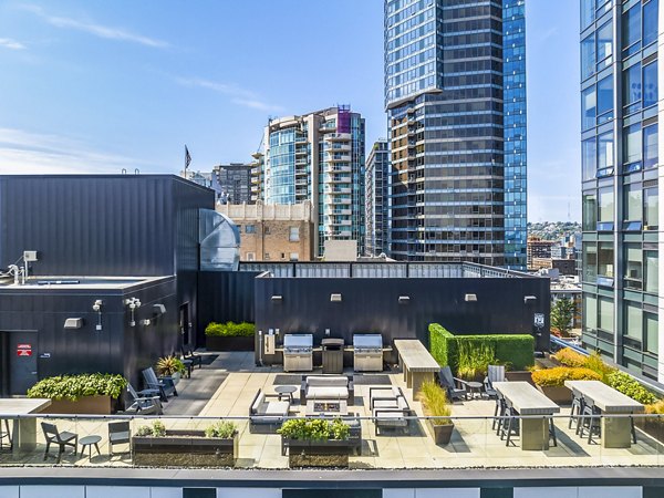 Spacious patio with modern seating at Sequel Apartments, luxury living in a prime location