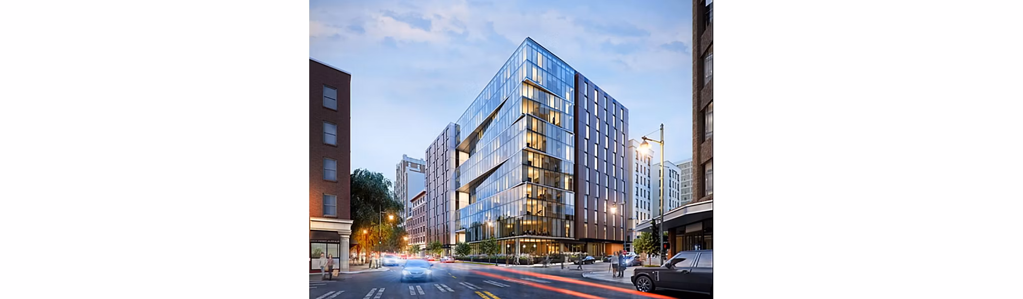 Street view of Sequel Apartments: Modern luxury building design in a vibrant urban setting