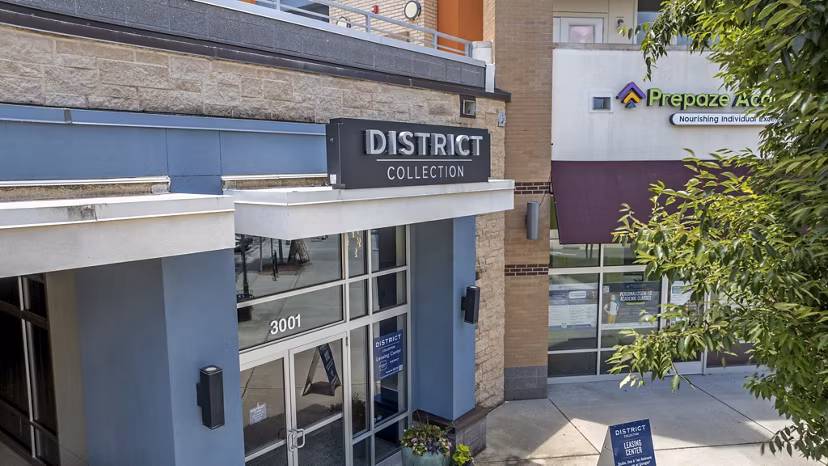 District Lofts: Modern building with prominent signage in urban setting