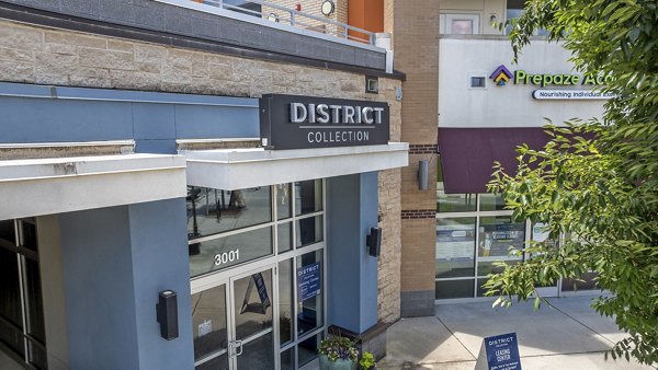 District Lofts: Modern building with prominent signage in urban setting
