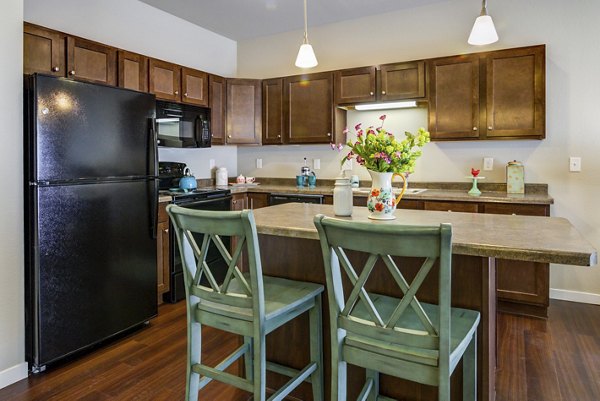 Spacious kitchen with modern appliances at South Ridge Apartments