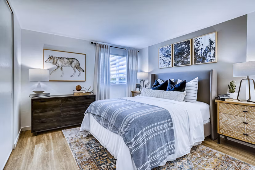 Cozy bedroom with modern furnishings at Park 120 Apartments