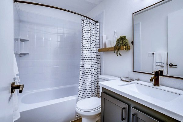 Bathroom featuring modern fixtures and elegant decor in Park 120 Apartments