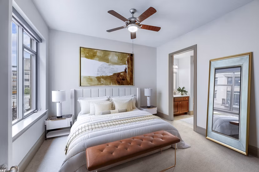Elegant bedroom with modern decor at Ashton at Judiciary Square Apartments